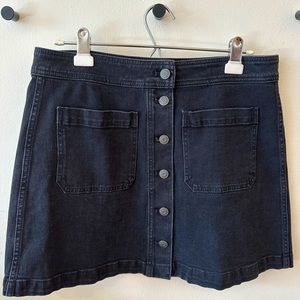 Black stretch denim mini skirt with front pockets | Madewell